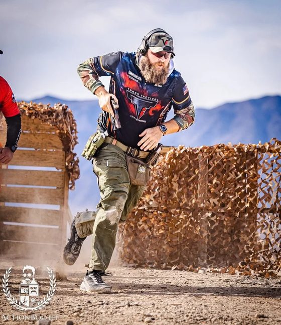 Brian Nelson moving through a stage with a pistol