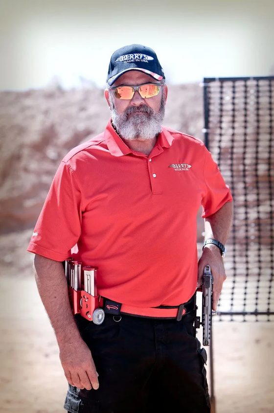 Jay Phillips in a red polo shirt