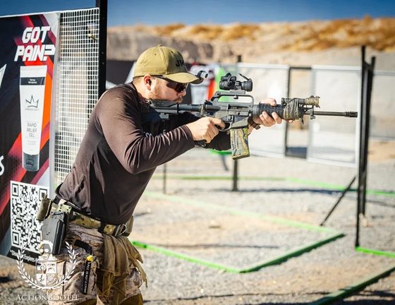 Joshua Cardenas aiming a rifle at a match